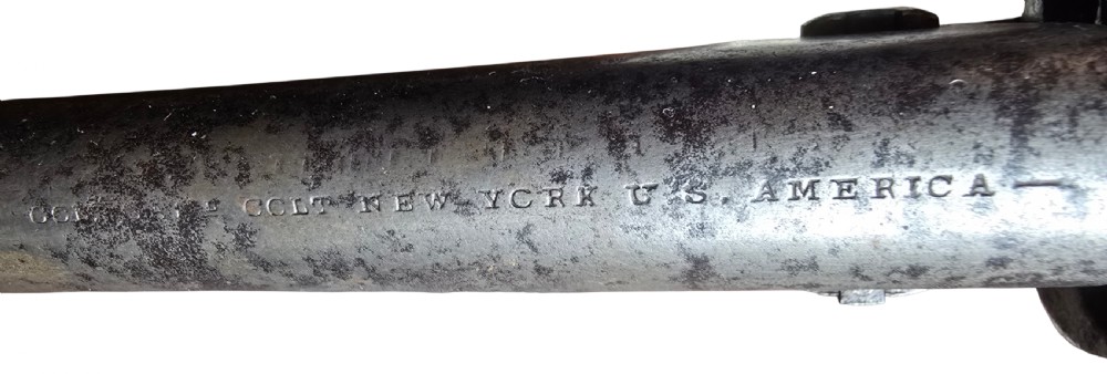 A 19th-century Colt Model 1860 Army percussion revolver featuring a steel barrel, creeping lever mechanism, brass trigger guard, and dark walnut grip. View V