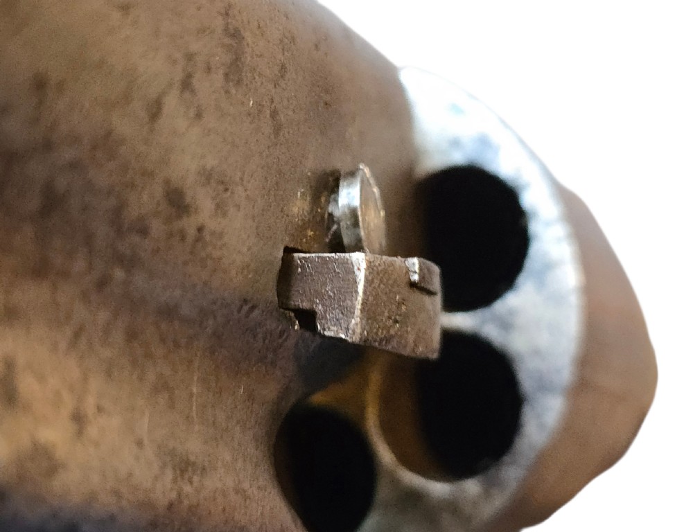 A 19th-century Colt Model 1860 Army percussion revolver featuring a steel barrel, creeping lever mechanism, brass trigger guard, and dark walnut grip. View XXIX