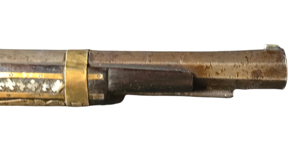 A late 18th-century Indo-Persian flintlock musket featuring a curved wooden stock inlaid with mother-of-pearl geometric patterns and bound with brass barrel bands. View XIII