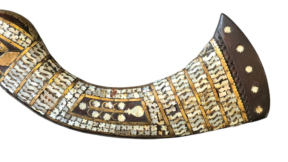 A late 18th-century Indo-Persian flintlock musket featuring a curved wooden stock inlaid with mother-of-pearl geometric patterns and bound with brass barrel bands. View XV