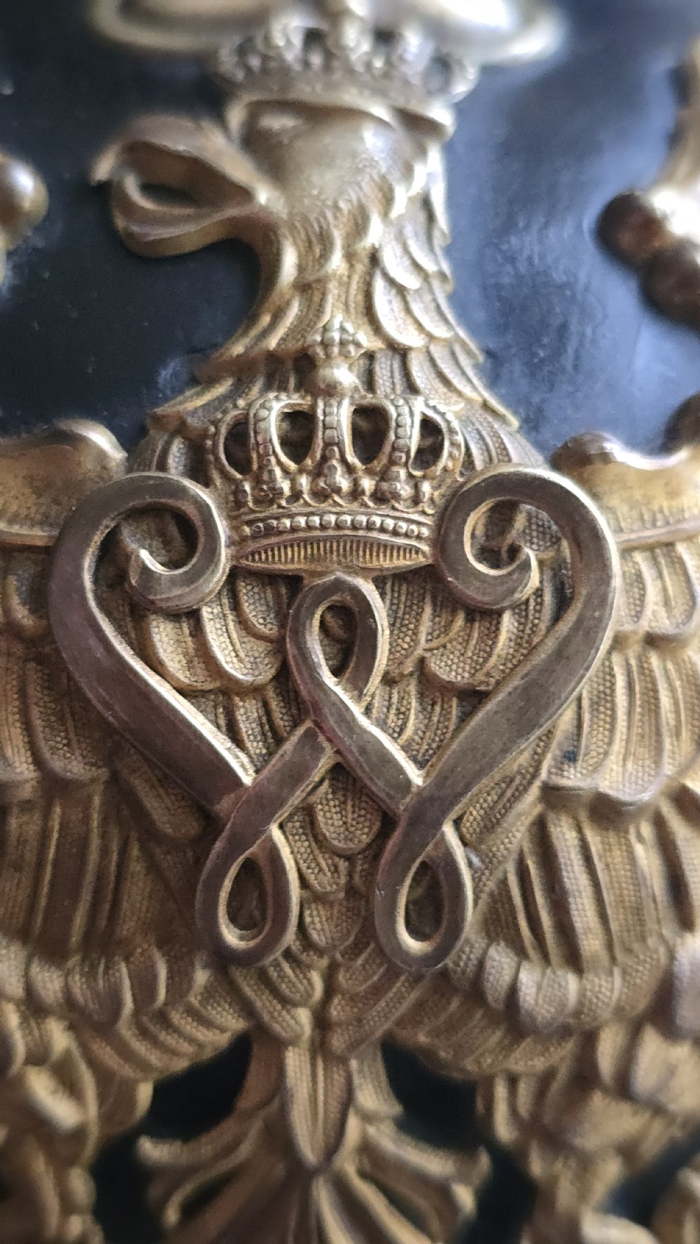 An Imperial German Prussian Model 1895 leather Pickelhaube helmet featuring a brass eagle front plate and a tall metal spike. View XVI