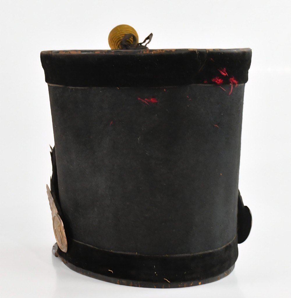 An antique black felt French National Guard Grenadier Officer shako hat featuring a silvered front plate with a Gallic rooster emblem, chin scales, a tricolour cockade, and a woven pompom. View XIX