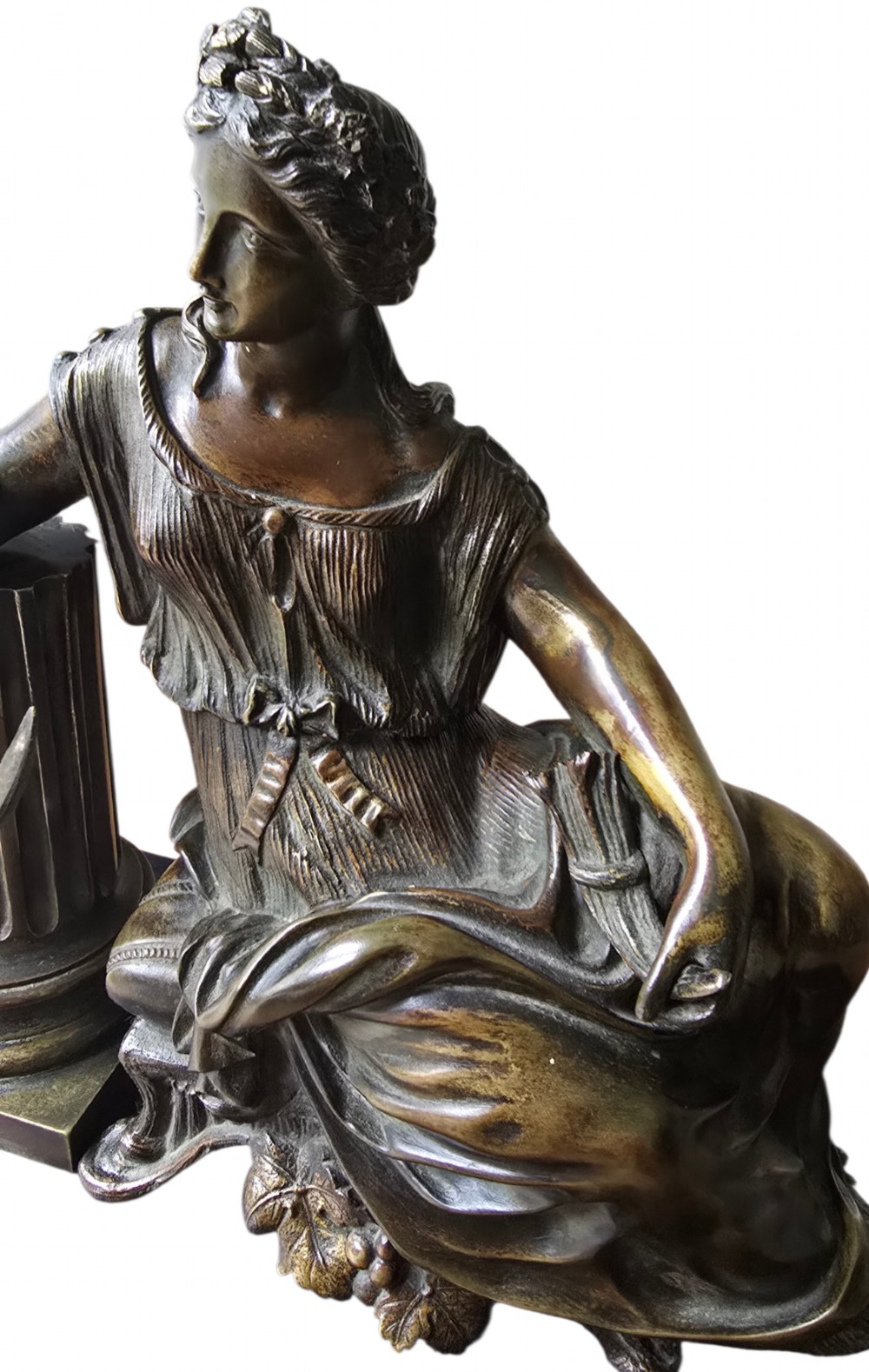 A 19th-century patinated bronze sculpture depicting the classical goddess Demeter seated beside a fluted column on a black stepped plinth. View III