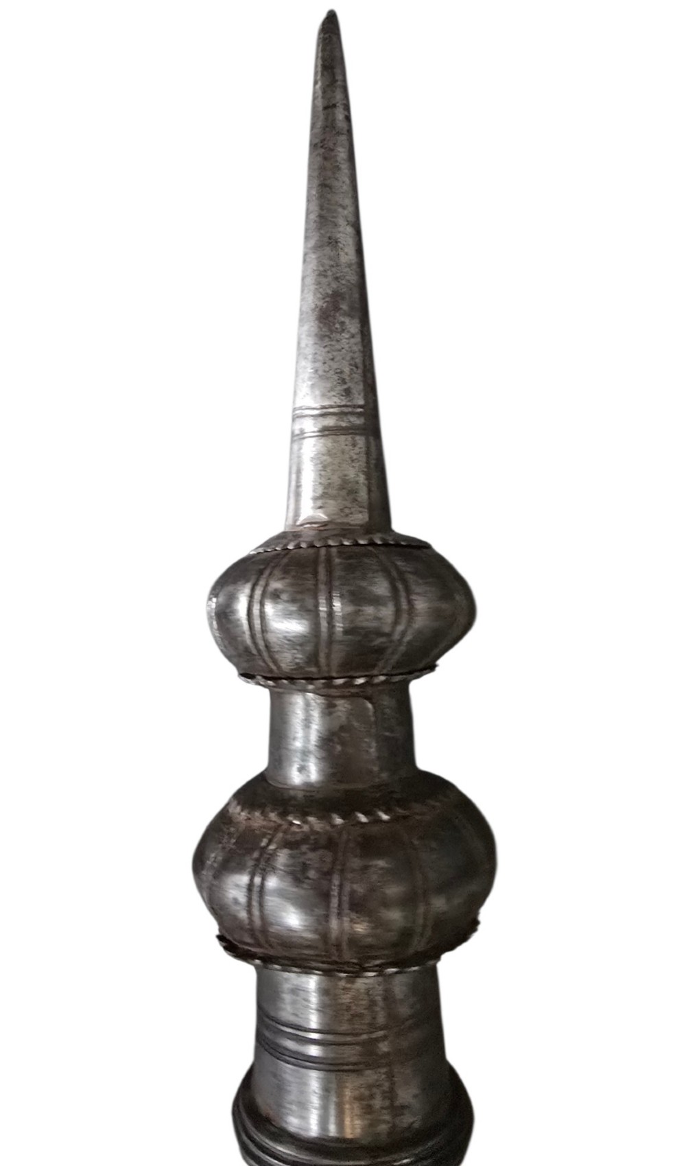 A 17th-century forged iron spear butt with a tapered spike and two ribbed knops, mounted vertically on a dark square stand. View XIII