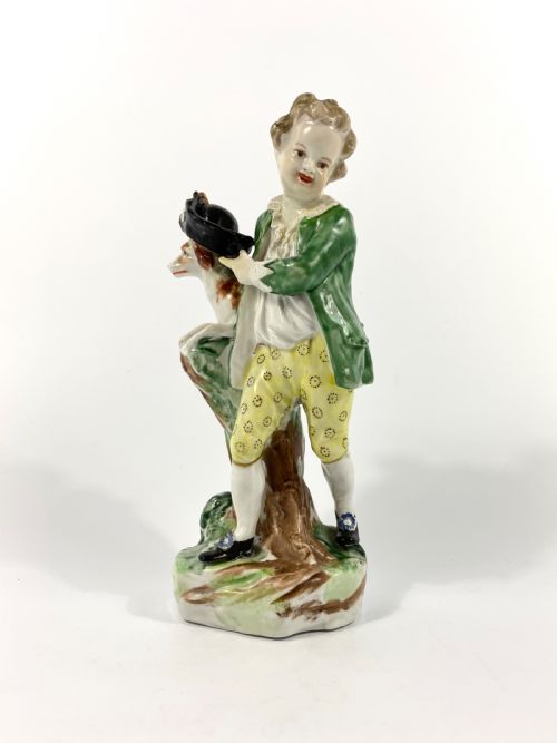 Bristol Porcelain Figure of a Boy with His Dog, C. 1775.