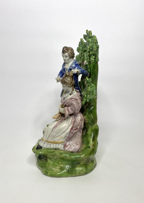 fig 1. Staffordshire bocage group, Hairdresser, c. 1820.