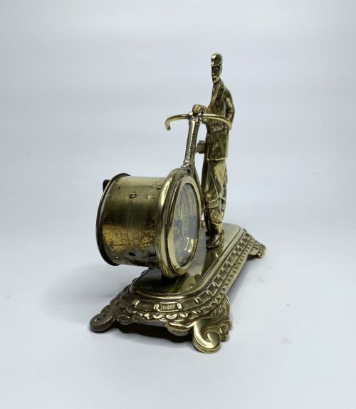 fig 1. Brass cyclist and bicycle clock, England, c. 1910.