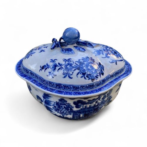 fig 1. An eighteenth-century Derby blue and white porcelain tureen and fitted cover featuring hand-painted chinoiserie landscape decoration and a sculptural finial.