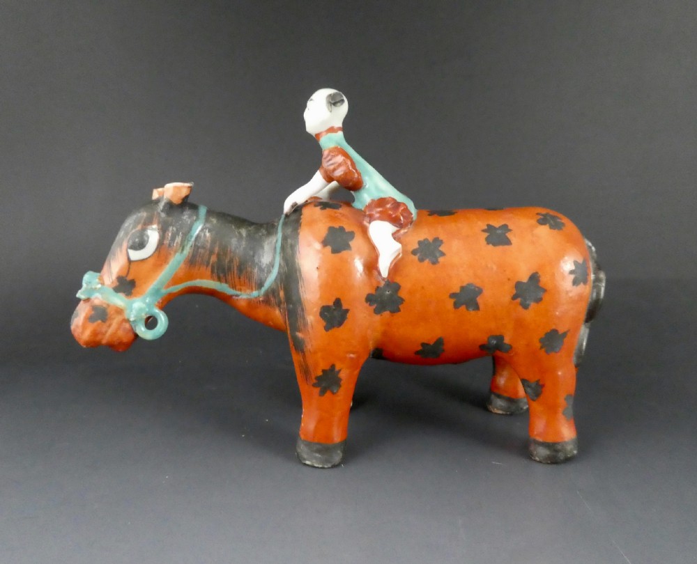 Chinese figure group of a boy riding a horse, c. 1800. Jiaqing Period.