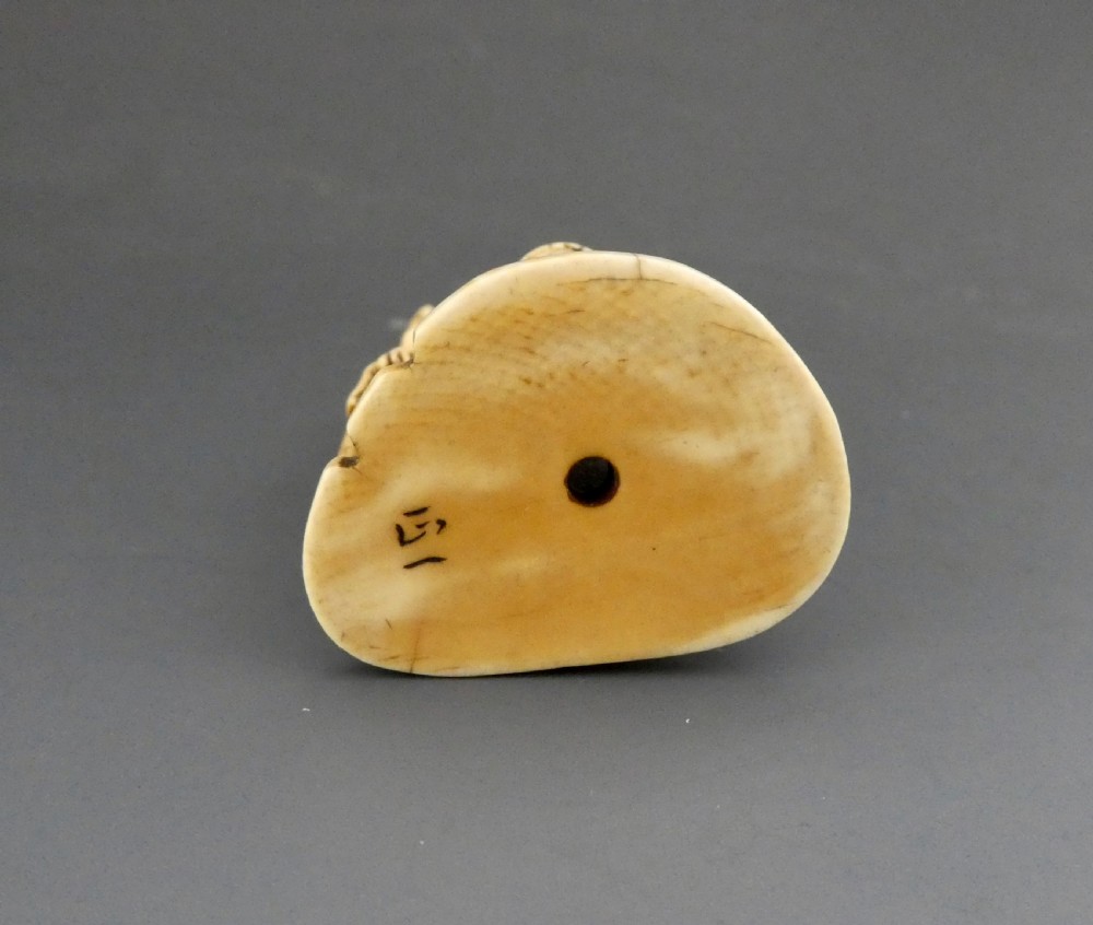 Japanese ivory group. Raiden & family. Meiji Period. View VII