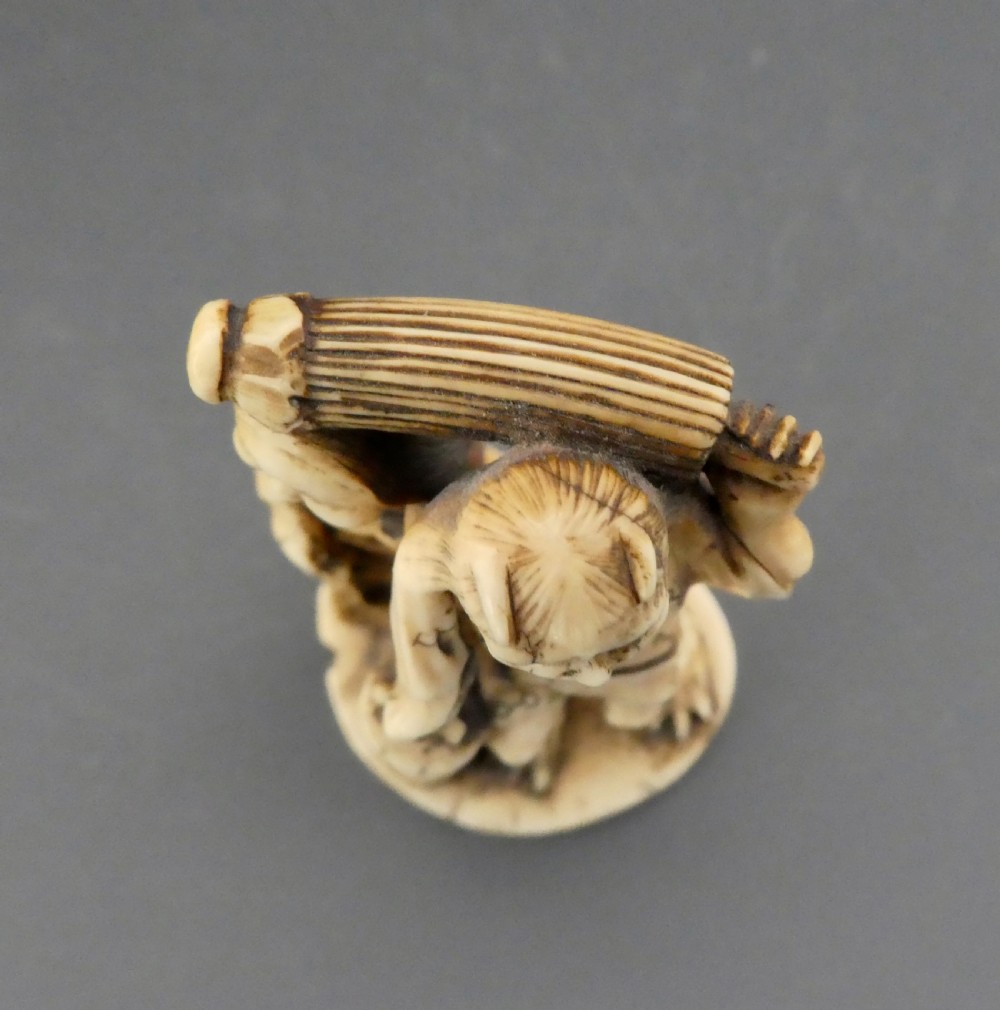 Japanese ivory group. Raiden & family. Meiji Period. View IX