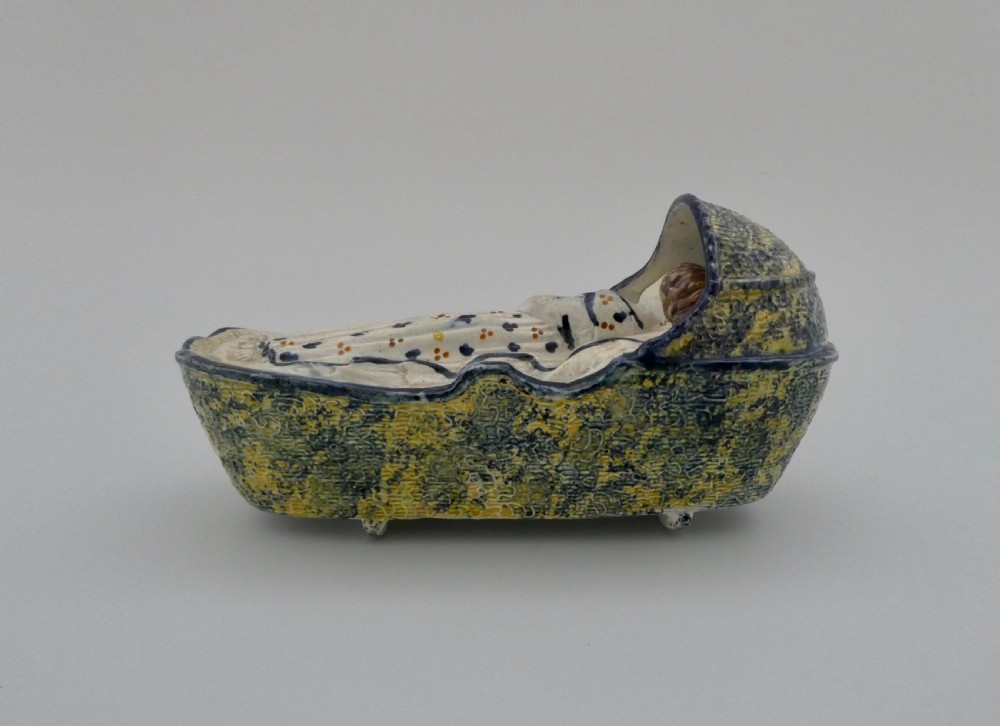 Large Staffordshire Prattware child in a cradle, c. 1800. View V