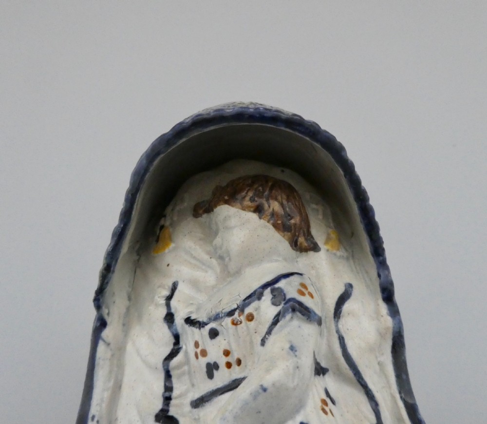 Large Staffordshire Prattware child in a cradle, c. 1800. View XI