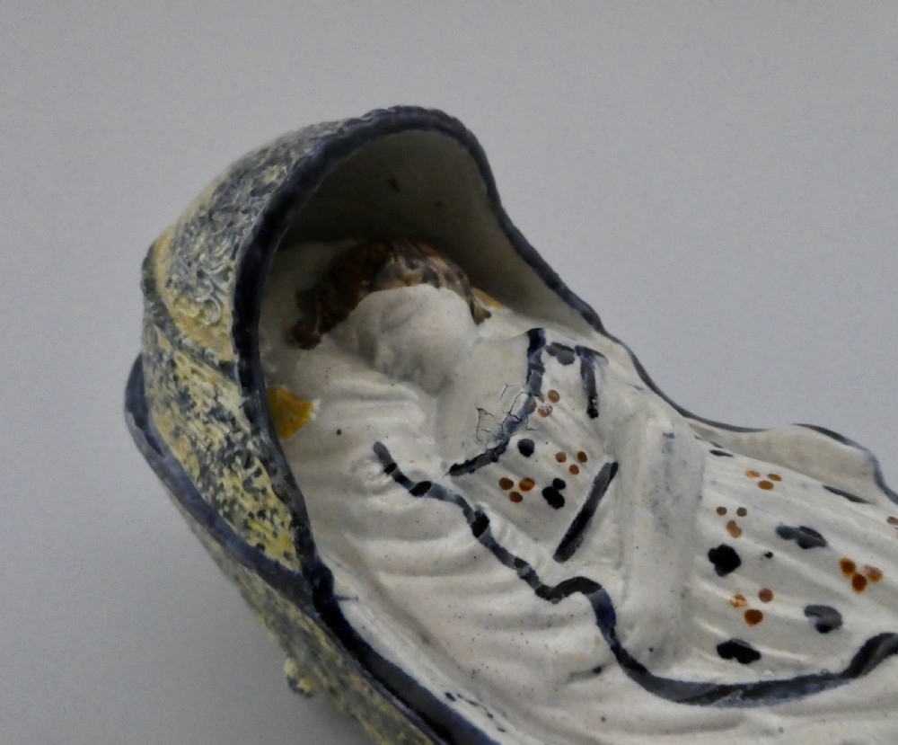 Large Staffordshire Prattware child in a cradle, c. 1800. View XII