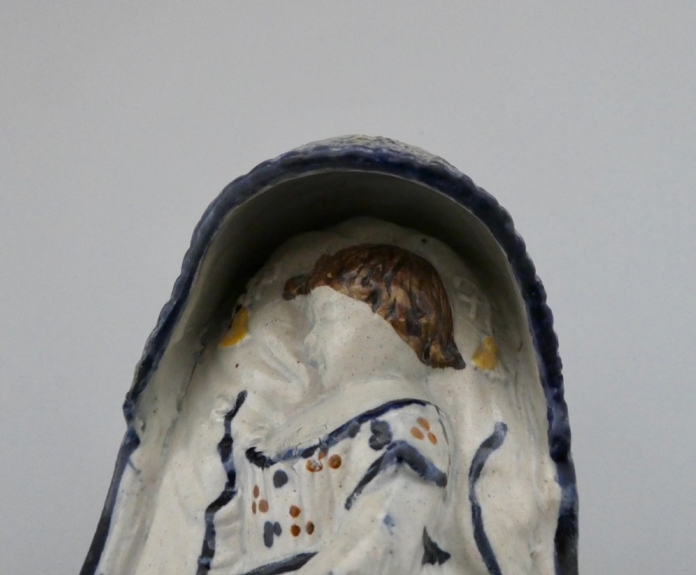 Large Staffordshire Prattware child in a cradle, c. 1800. View XIV