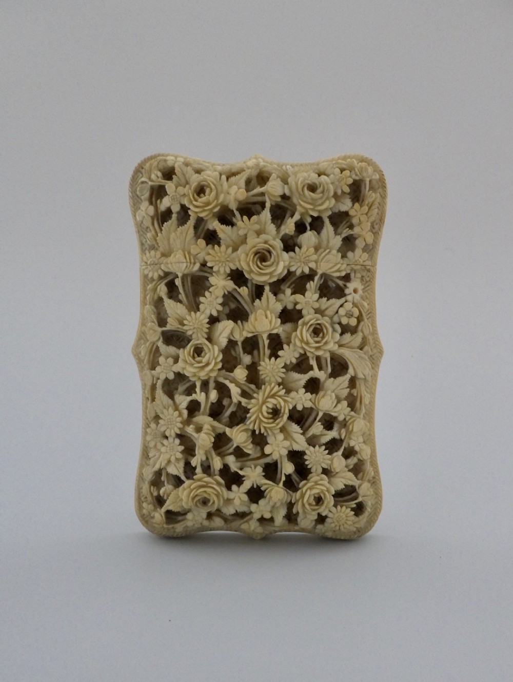 Chinese carved ivory card case of large size, Canton, c. 1820.