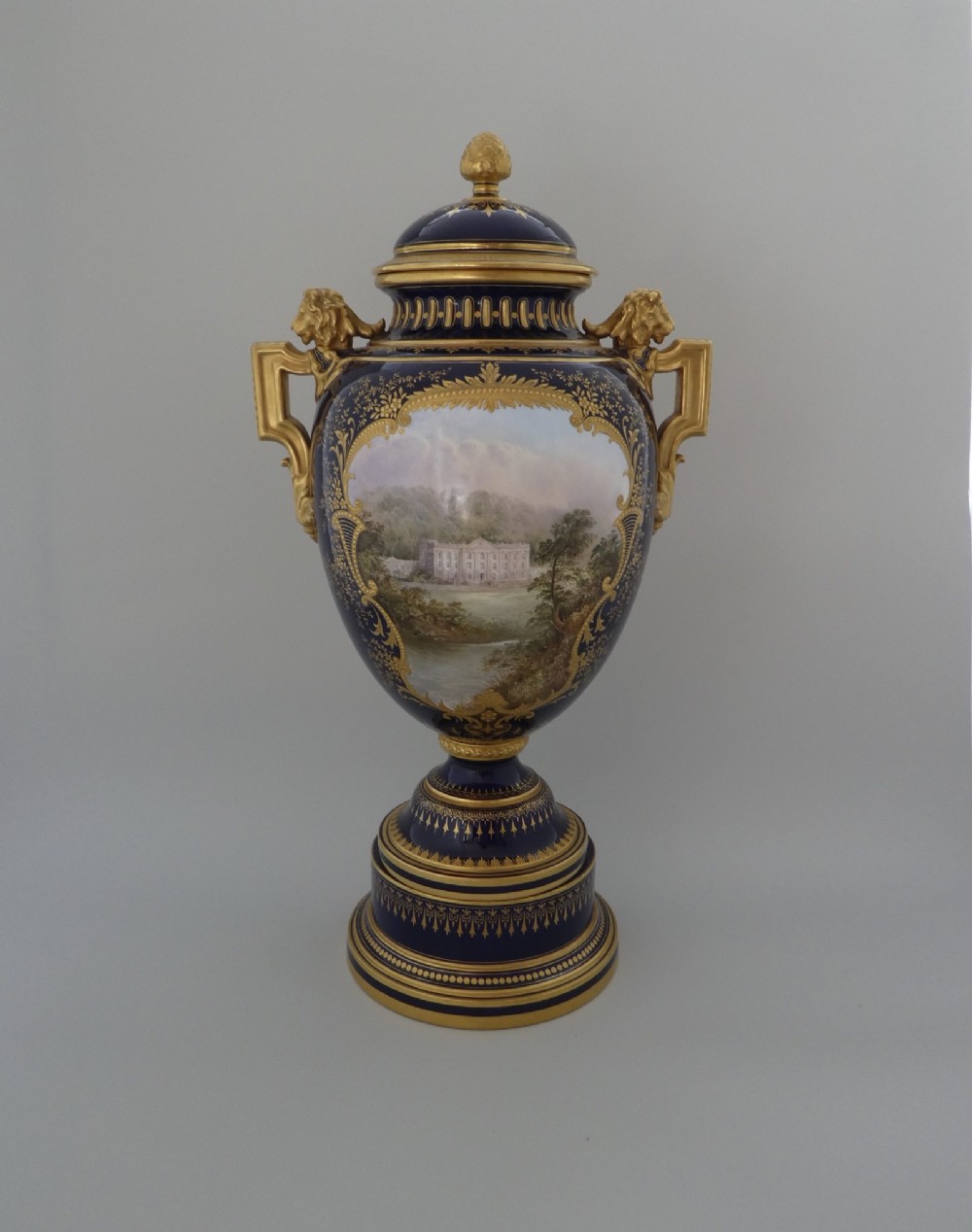Coalport porcelain Vase and cover. ‘Chatsworth House’, J.H.Plant, c. 1900.