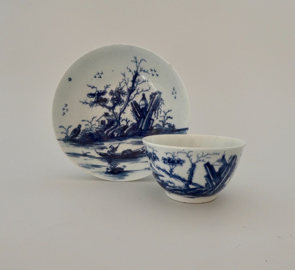 Worcester porcelain Rearing Rock Island teabowl and saucer, c. 1756.