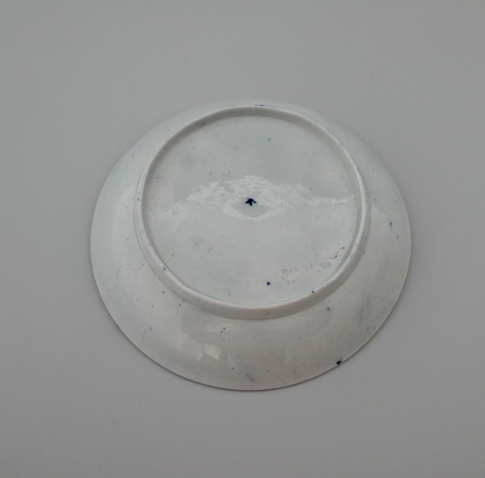 Worcester porcelain Rearing Rock Island teabowl and saucer, c. 1756. View V