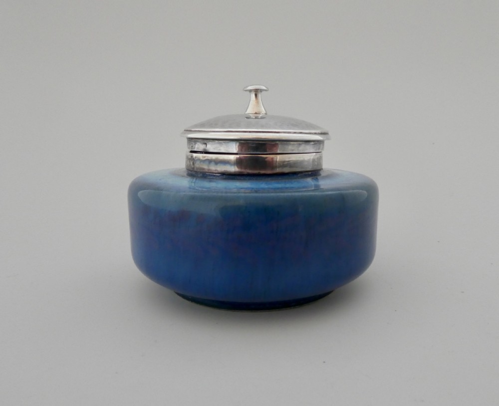 Ruskin inkwell c. 1900, with later Guild of Handicraft silver mounts.