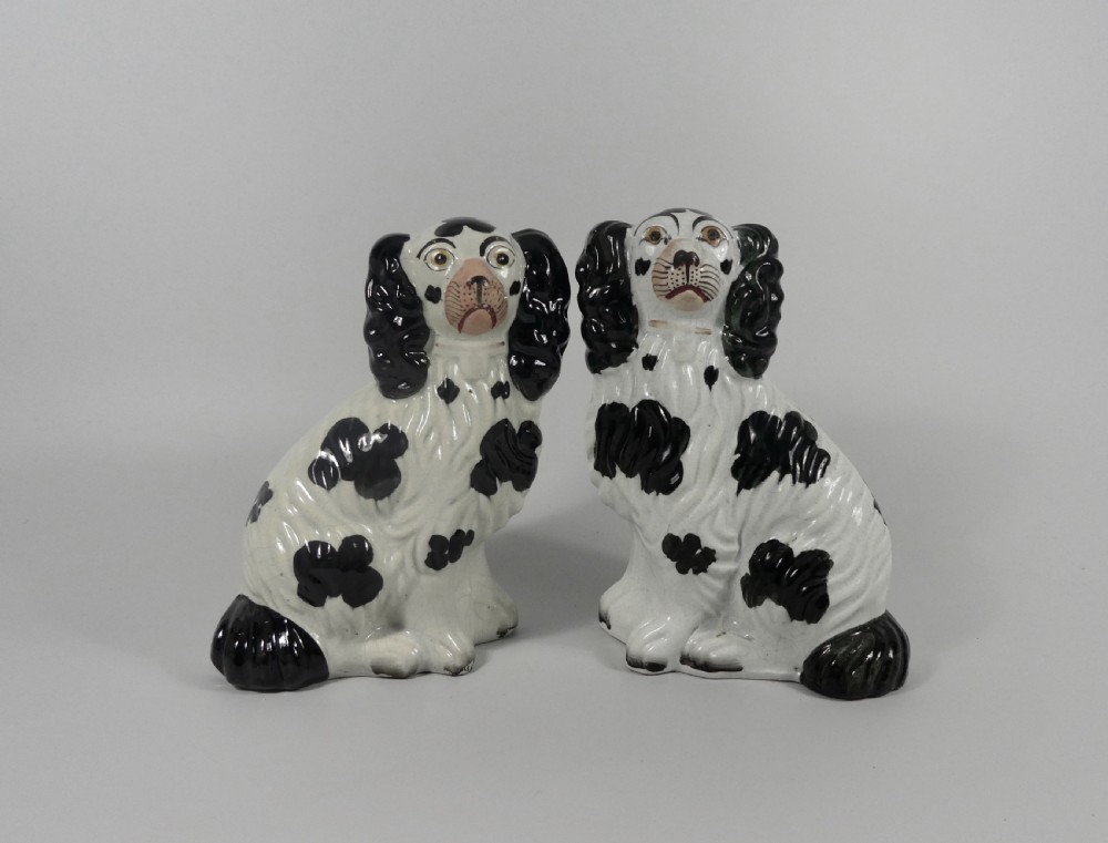 Pair Staffordshire pottery Spaniels, c. 1860.