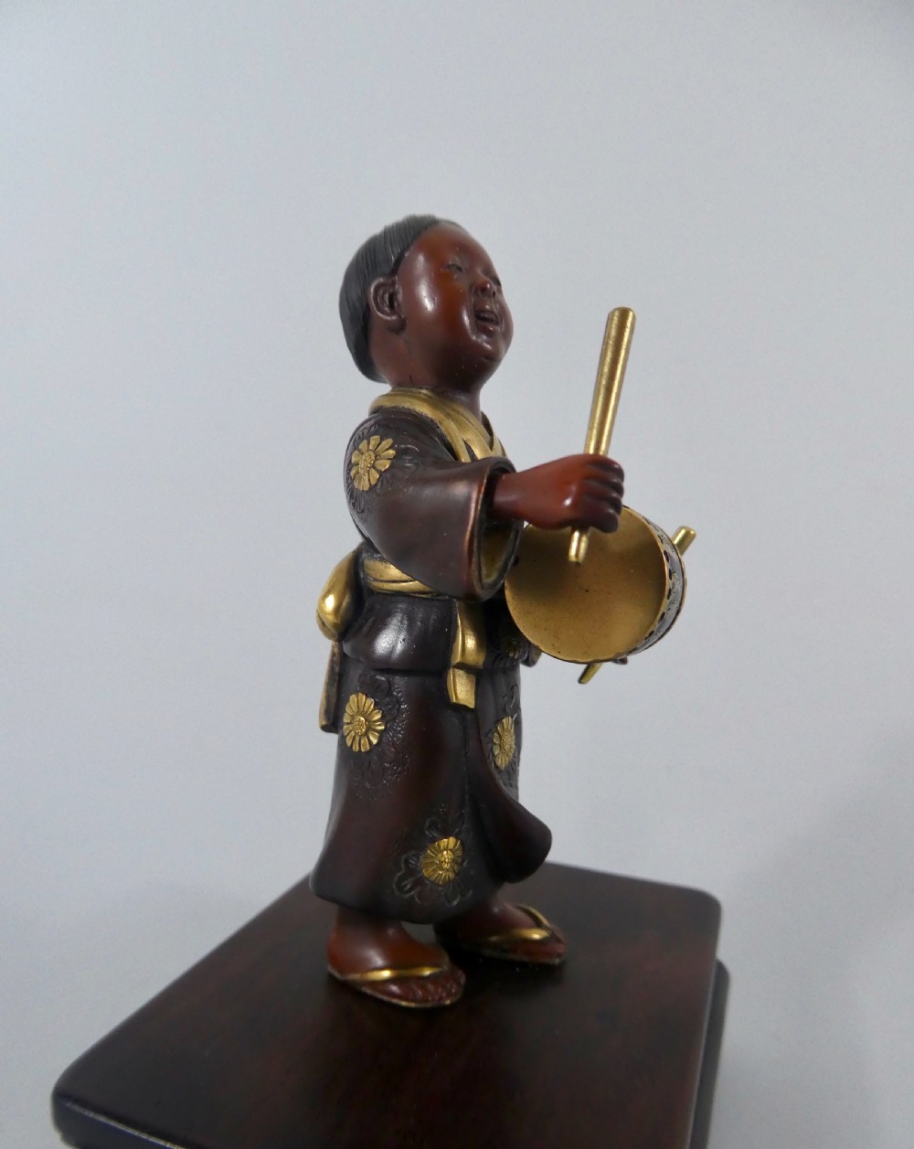 Japanese bronze okimono of a boy. Meiji Period. View V