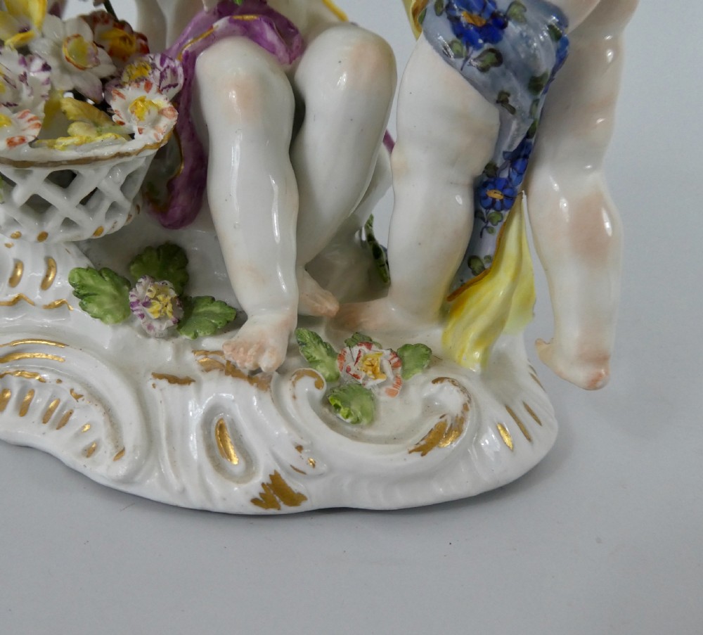 Meissen group of Putti gathering flowers, c. 1740. View IX