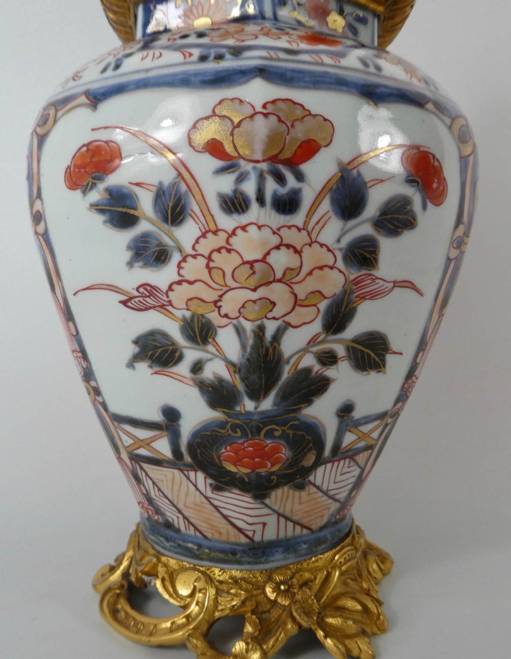 Pair Japanese Imari porcelain vases & covers, c. 1690. Genroku Period. View III