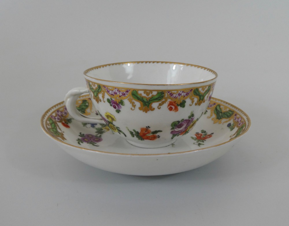 Bristol porcelain cup, saucer & spoon, c. 1775. Ludlow Service. View IX