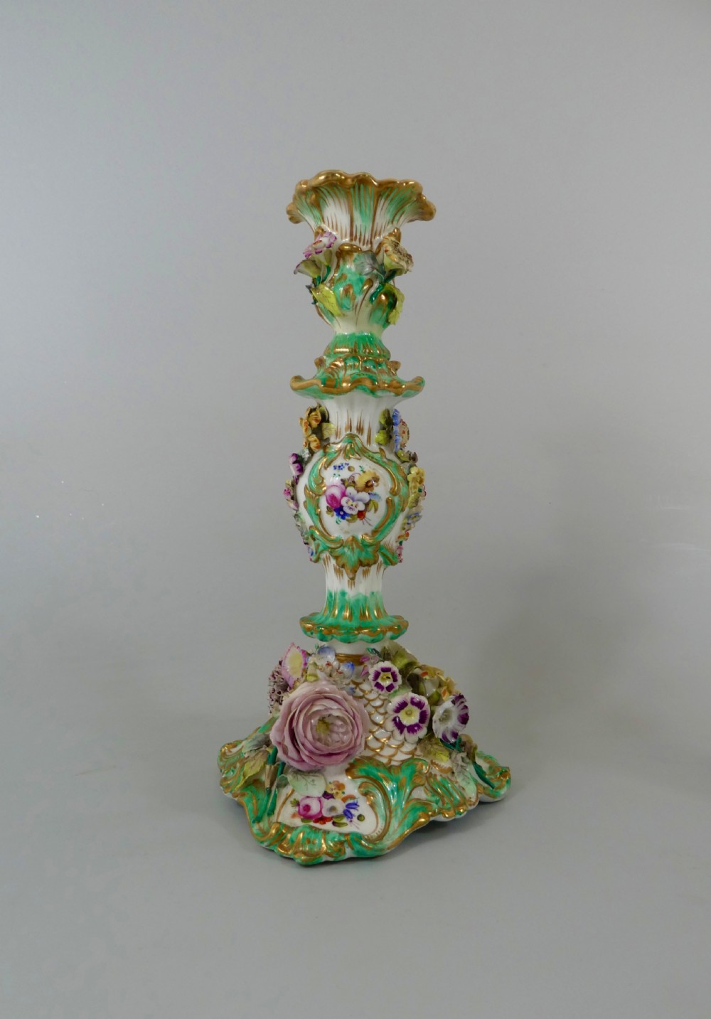 Pair Coalport flower encrusted porcelain candlesticks, c. 1830. View II