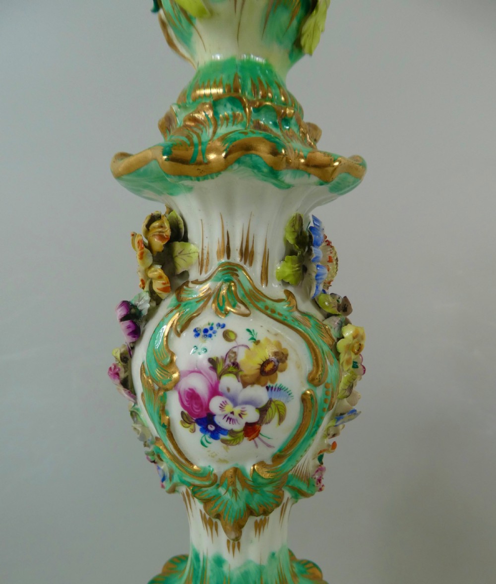 Pair Coalport flower encrusted porcelain candlesticks, c. 1830. View IV