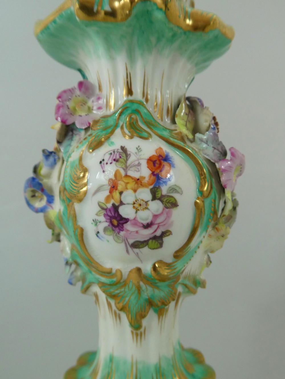 Pair Coalport flower encrusted porcelain candlesticks, c. 1830. View XIV