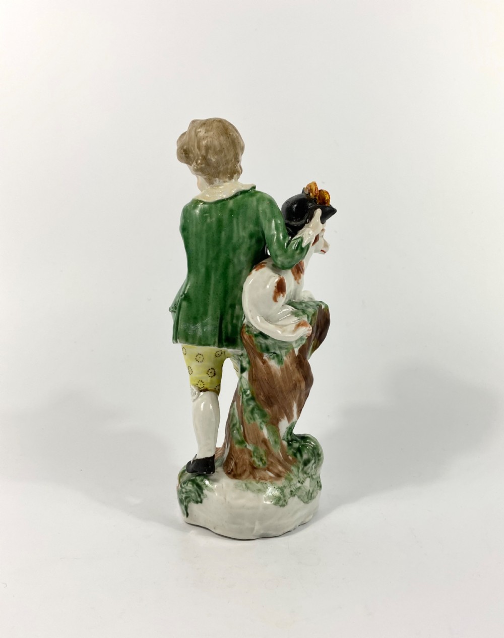 Bristol porcelain figure of a boy with his dog, c. 1775. View III