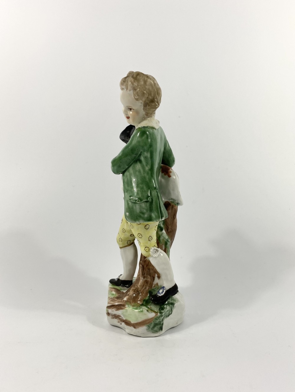 Bristol porcelain figure of a boy with his dog, c. 1775. View IV