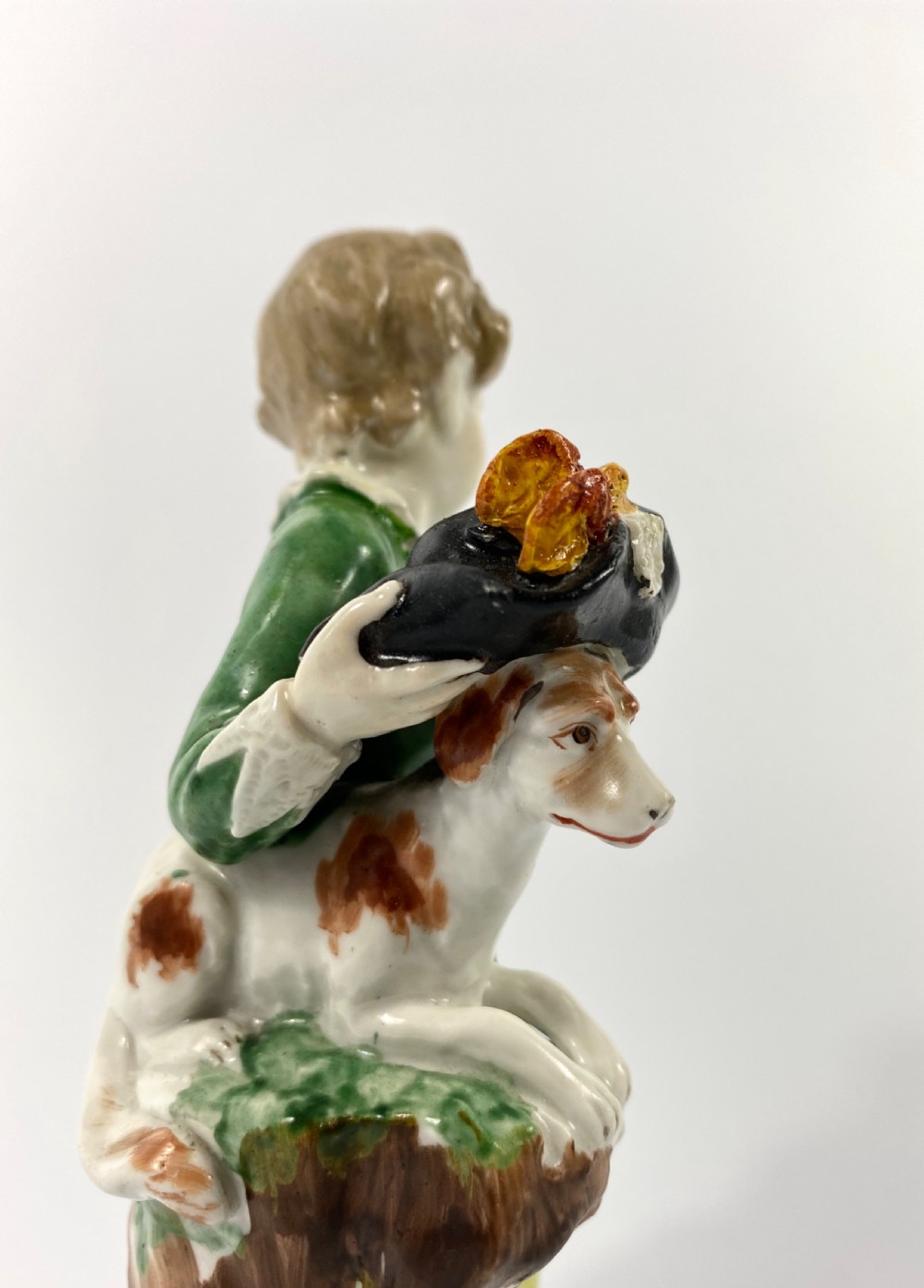Bristol porcelain figure of a boy with his dog, c. 1775. View X