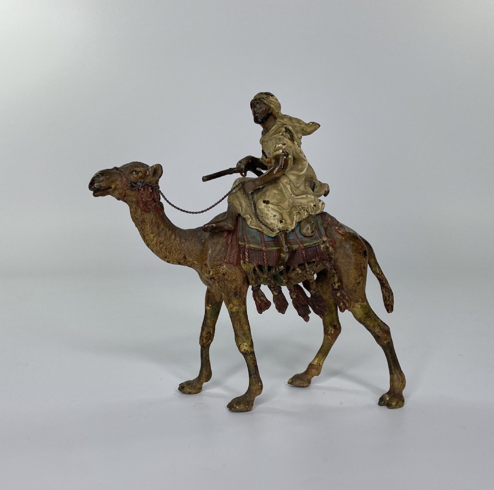 Franz Bergman bronze Arab on a camel, c. 1900.