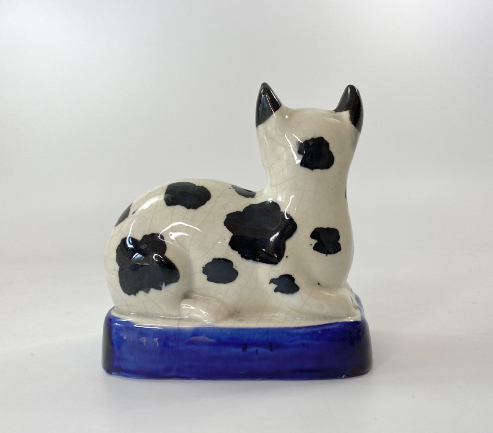 Staffordshire pottery recumbent cat, c. 1850. View IV