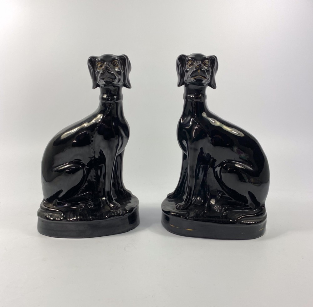 Pair Staffordshire ‘Jackfield’ Lurchers, c. 1860.
