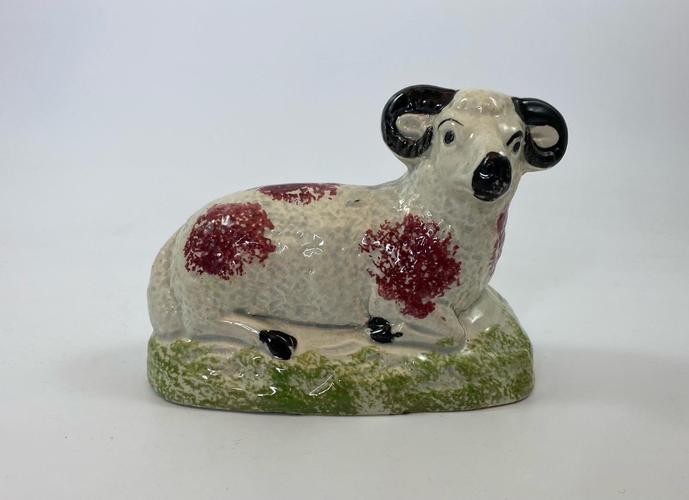 English pottery recumbent ram, c. 1830.