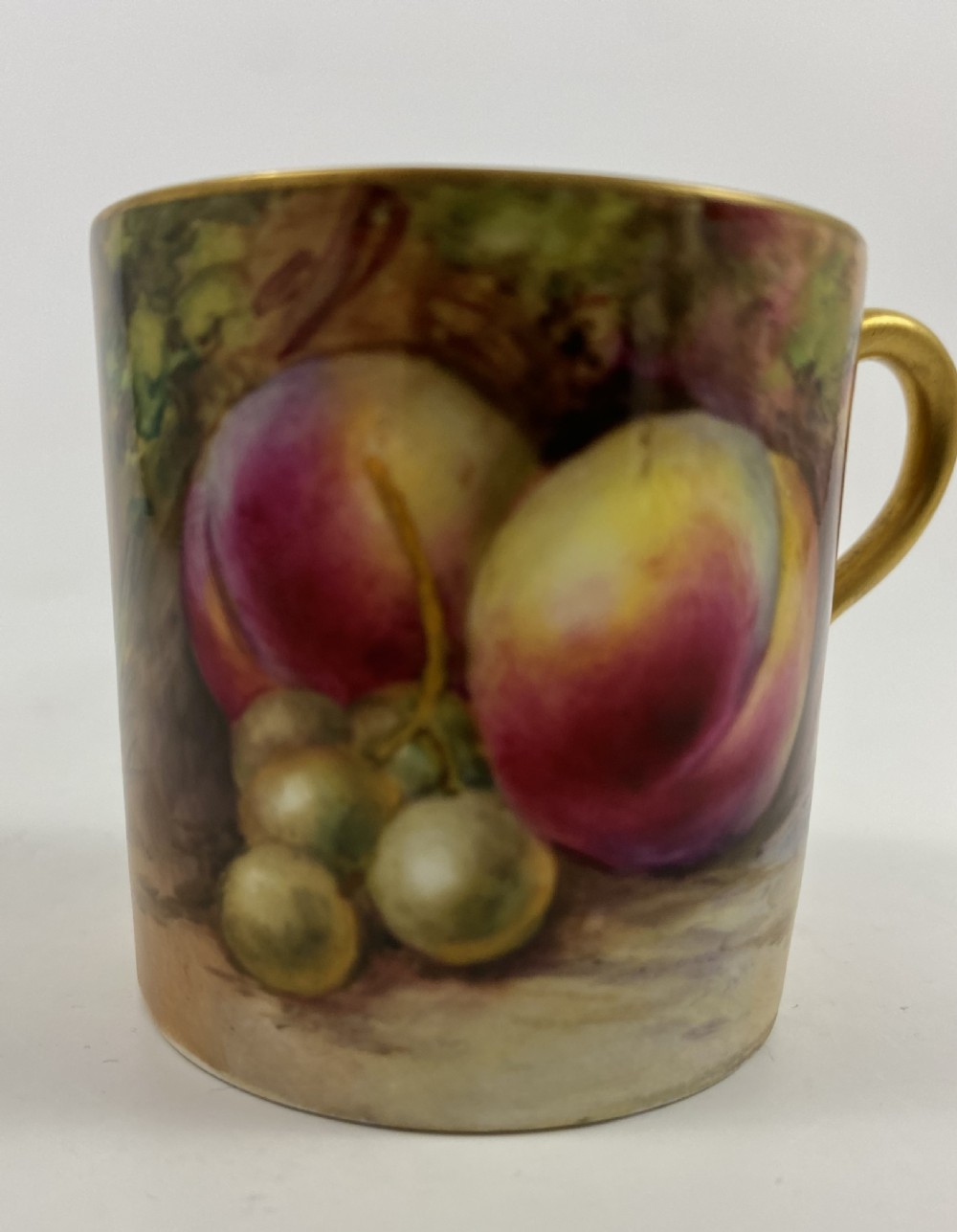 Royal Worcester ‘Fruit’ coffee can and saucer, dated 1924. View IX