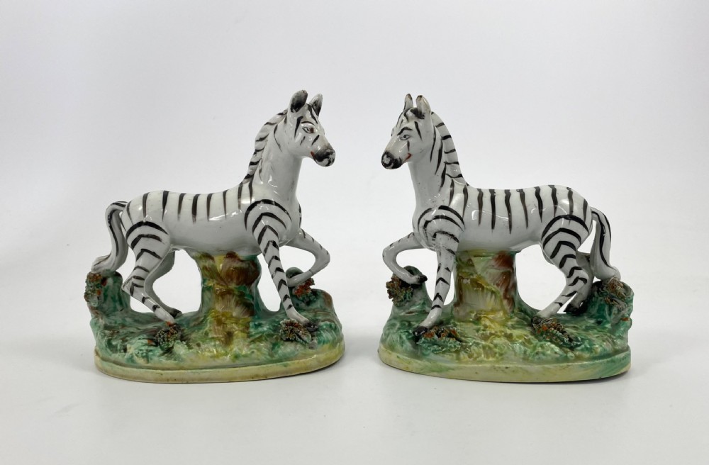 Pair Staffordshire pottery Zebra, c. 1860.