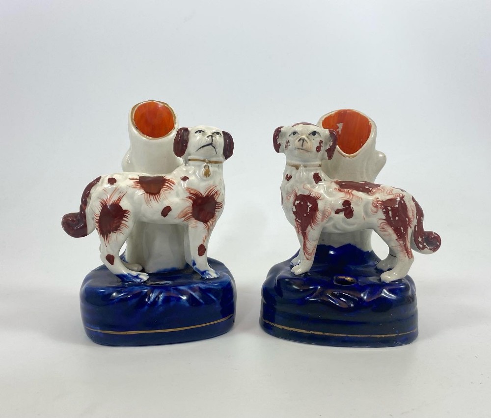 Pair Staffordshire dog spill vases, c. 1860.