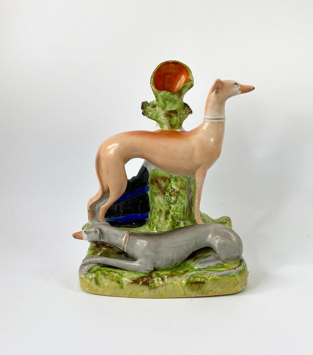 Staffordshire pottery group of greyhounds, c.1860.