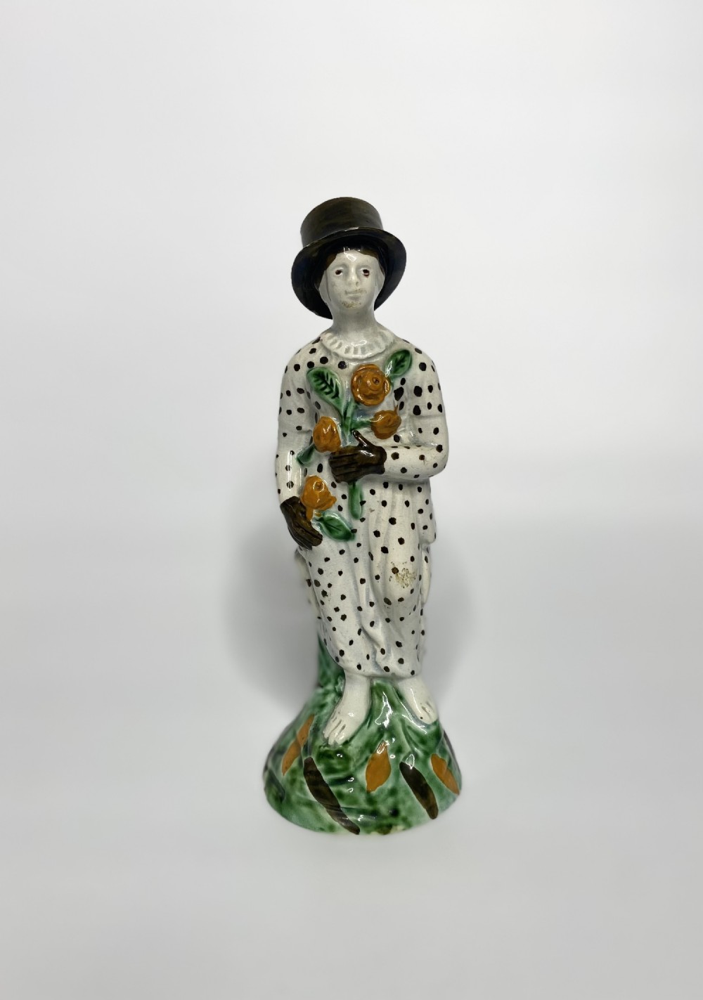 Rare Pratt ware figure of a gardener, c. 1790. 