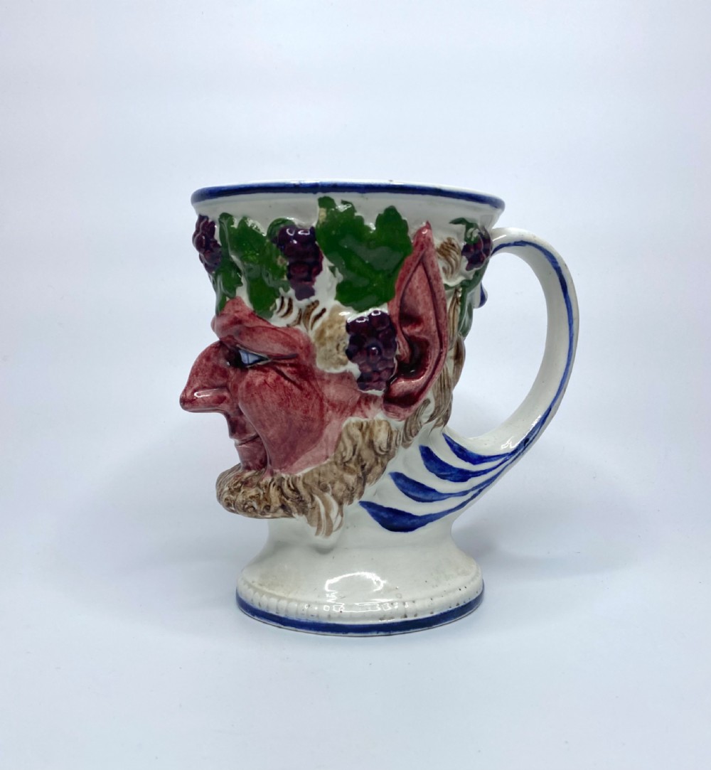 Scottish pottery Bacchus mug, of large size, c. 1840.