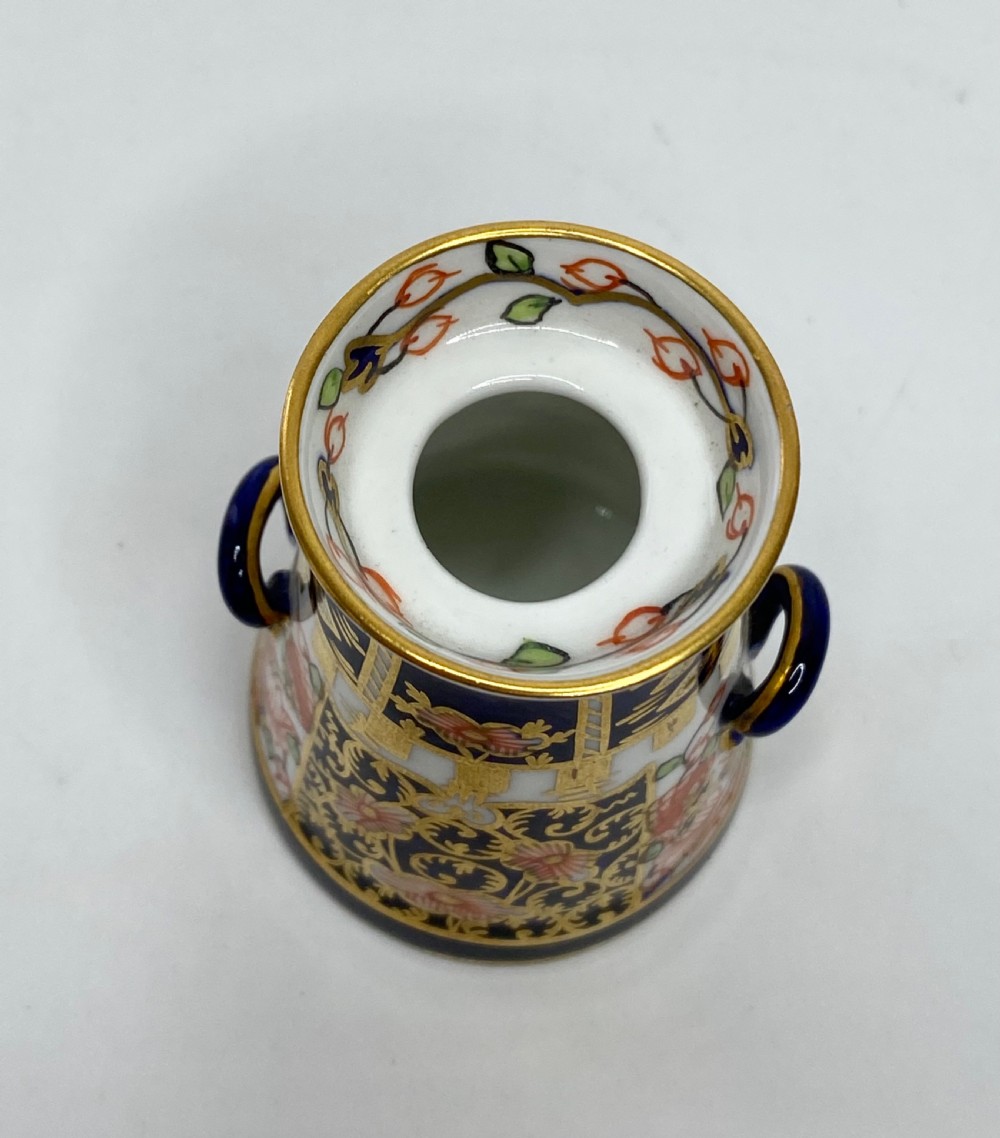 Royal Crown Derby milk churn and cover, dated 1921. View V