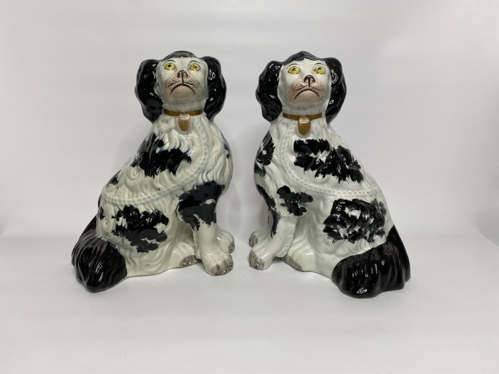 Pair of rare and large Staffordshire Spaniels, c. 1840.