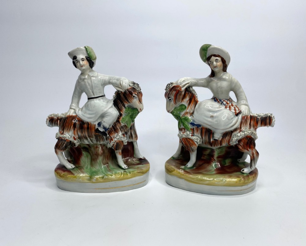 Pair Staffordshire Royal Children on goats, c. 1850.