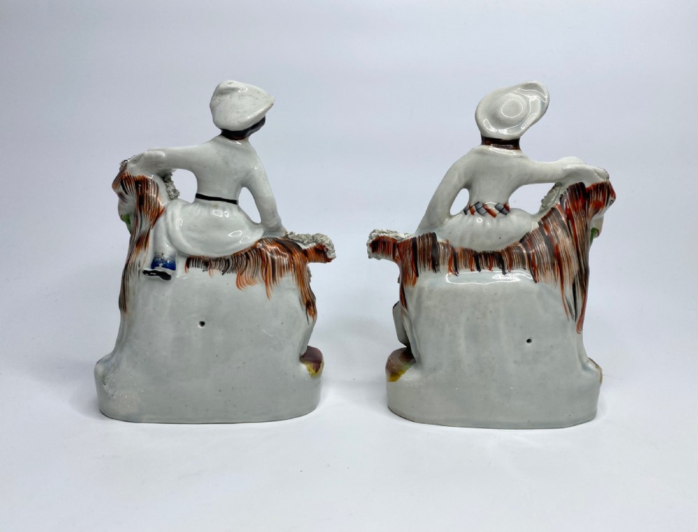 Pair Staffordshire Royal Children on goats, c. 1850. View II