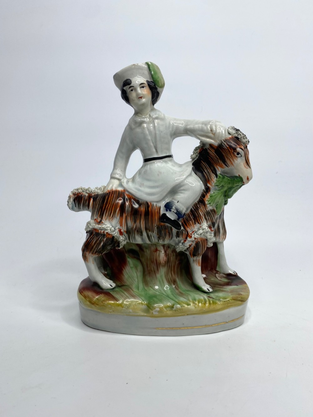 Pair Staffordshire Royal Children on goats, c. 1850. View III